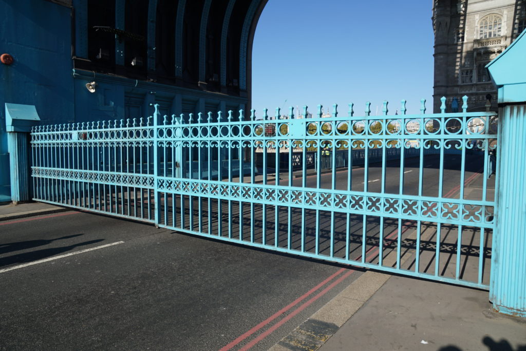 Gates closed for the opening of Tower Bridge, London, England